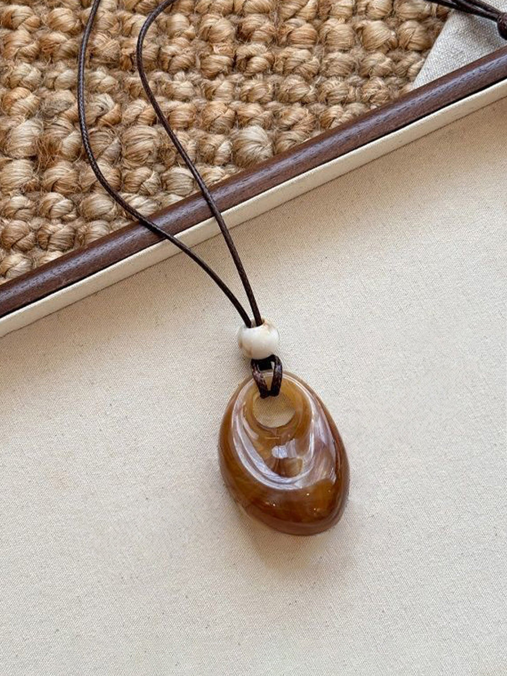 Long Pendant Necklace With Marbled Design